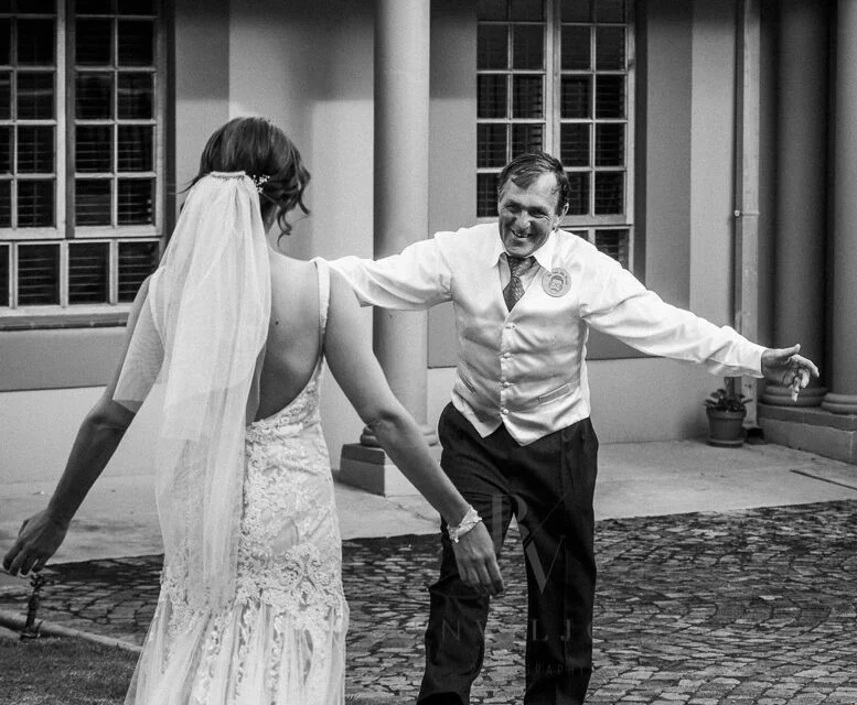 December 2017 - A joyful moment when Melanie Terblanche meets her father at Guesthouse @ 56 before travelling to the wedding venue.