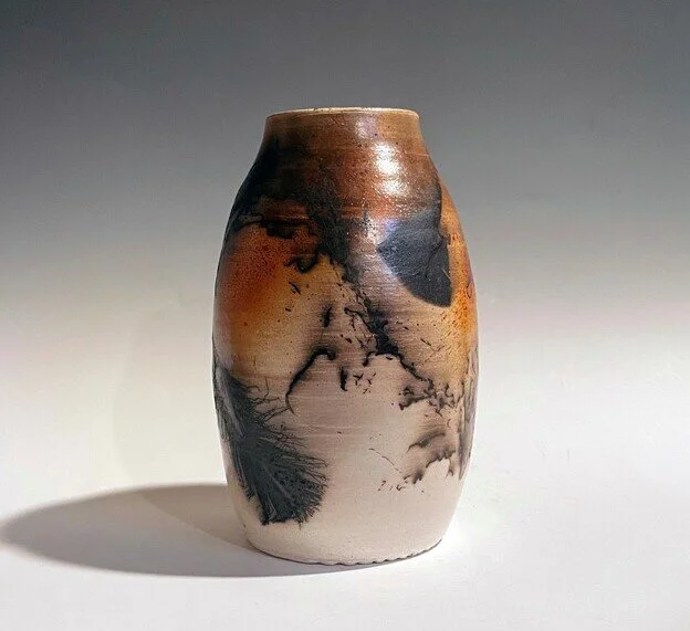 Murmuration  (horsehair raku, white stoneware)