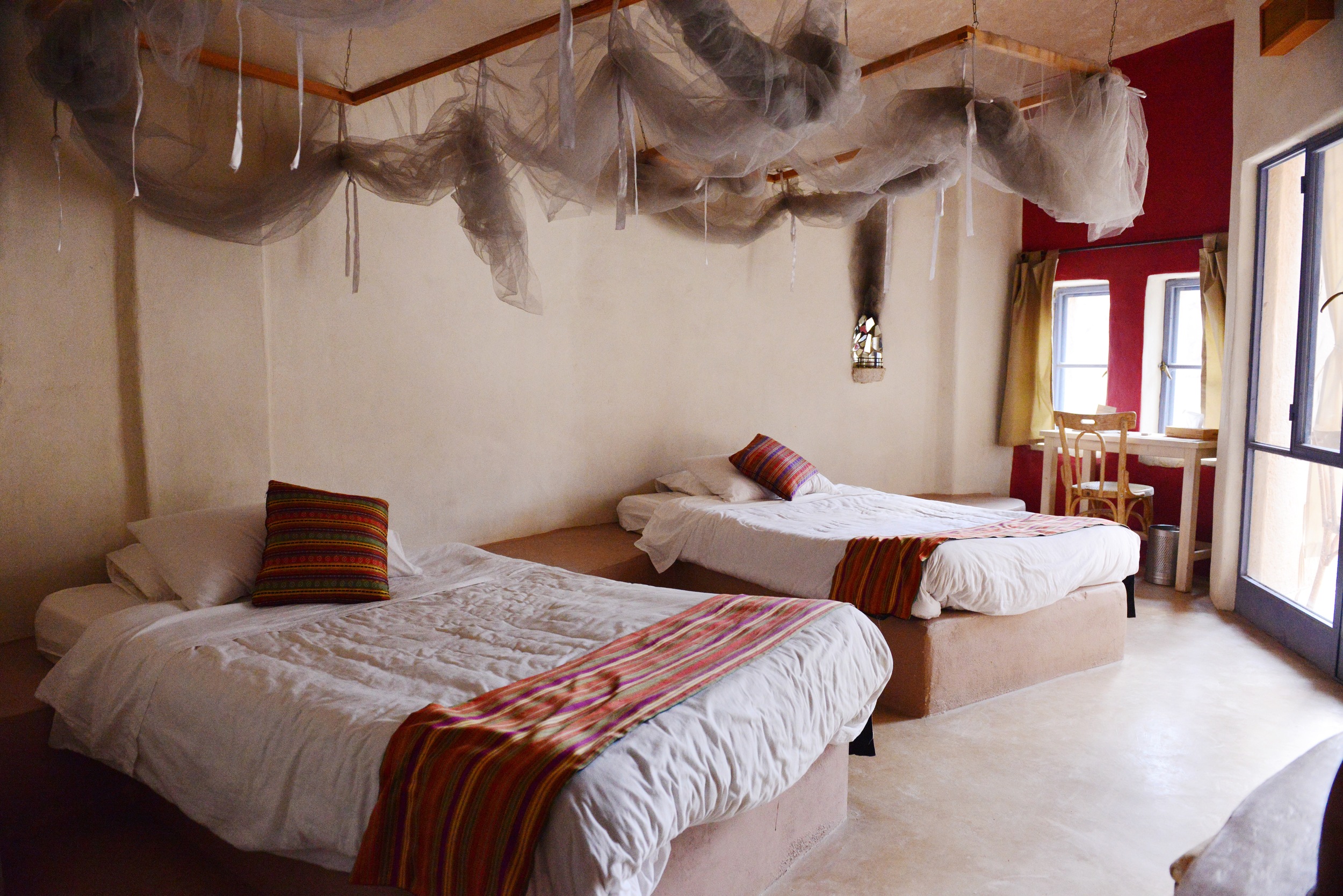 Double guestroom with balcony at Feynan Ecolodge.