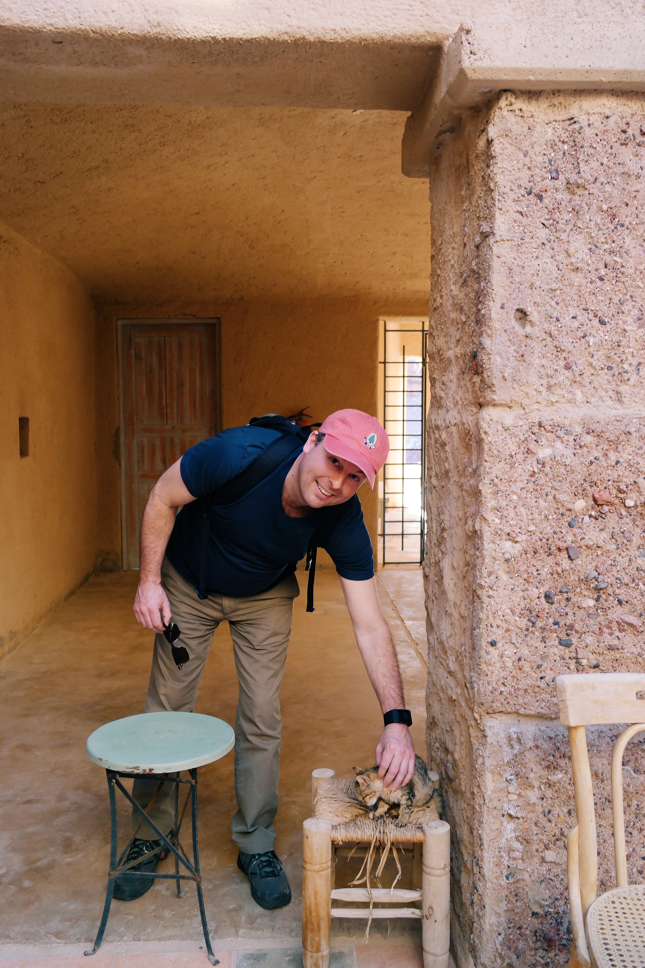 Ramsey making a new friend in the main courtyard at Feynan Ecolodge.
