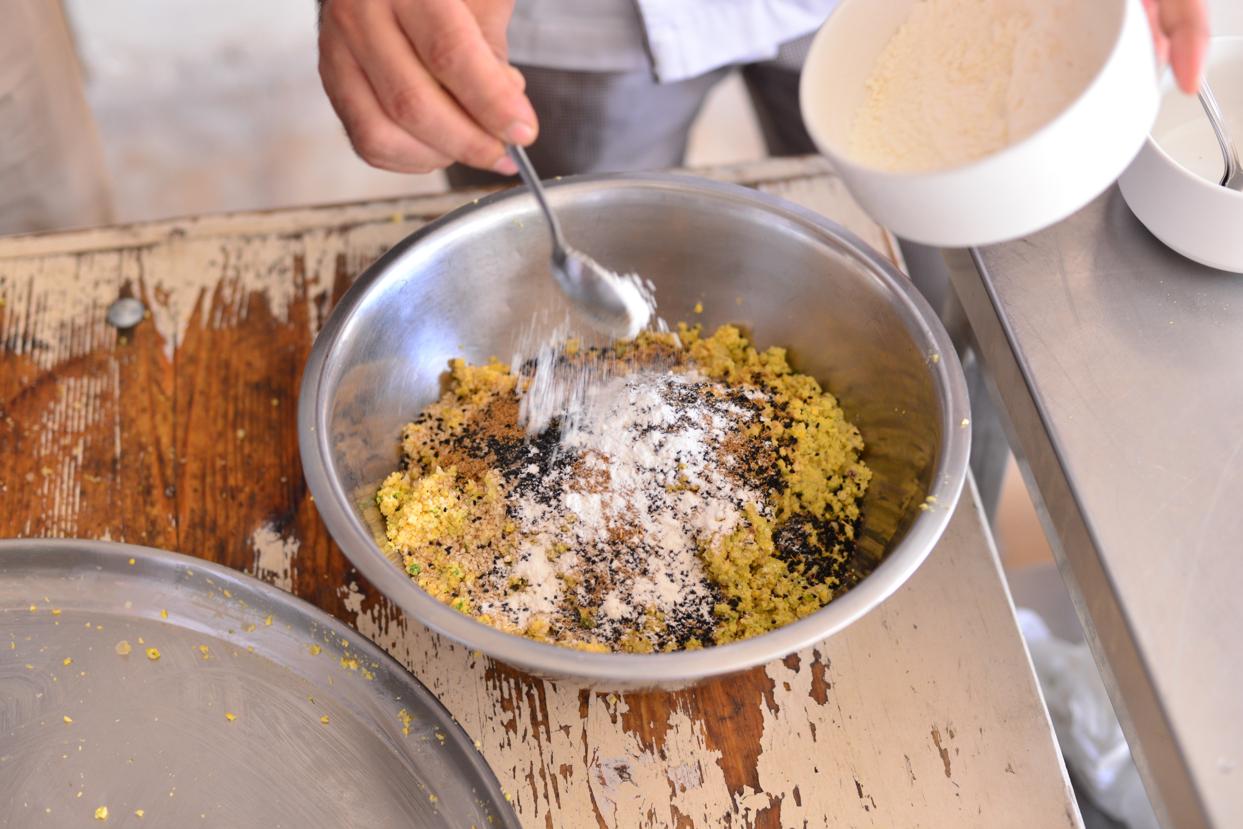 Mixing the falafel ingredients together.