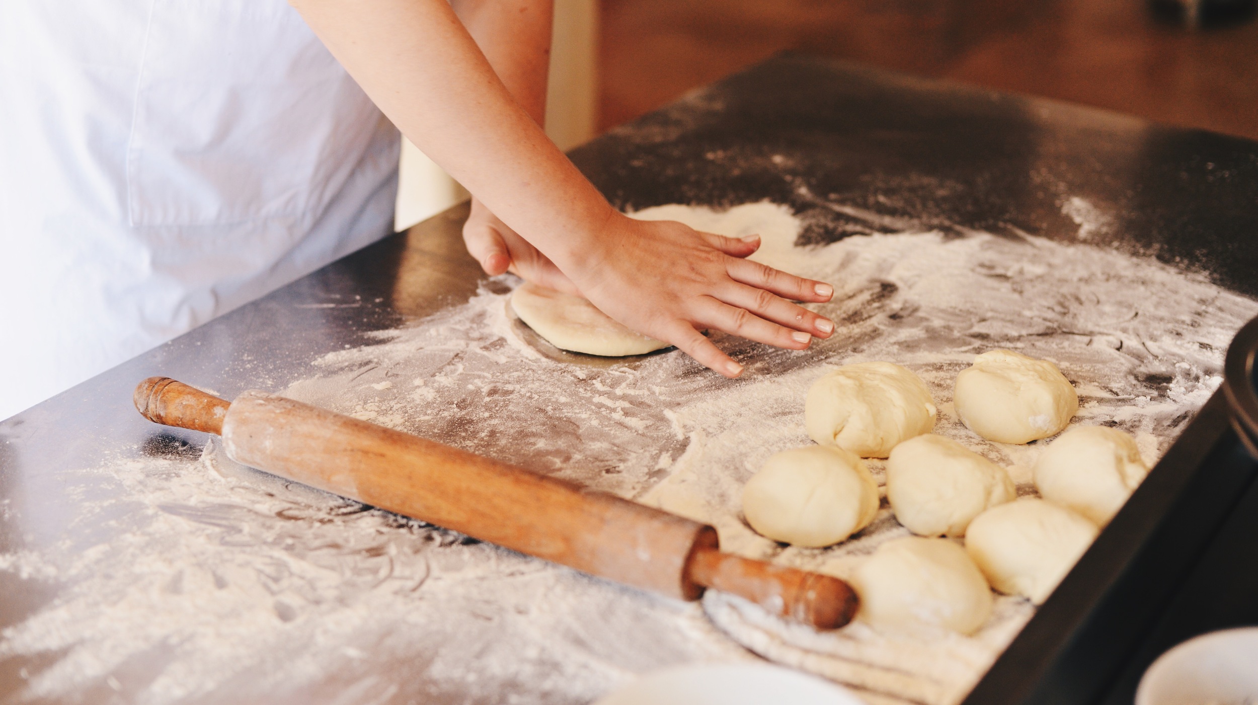 Rolling dough for the manakeesh.