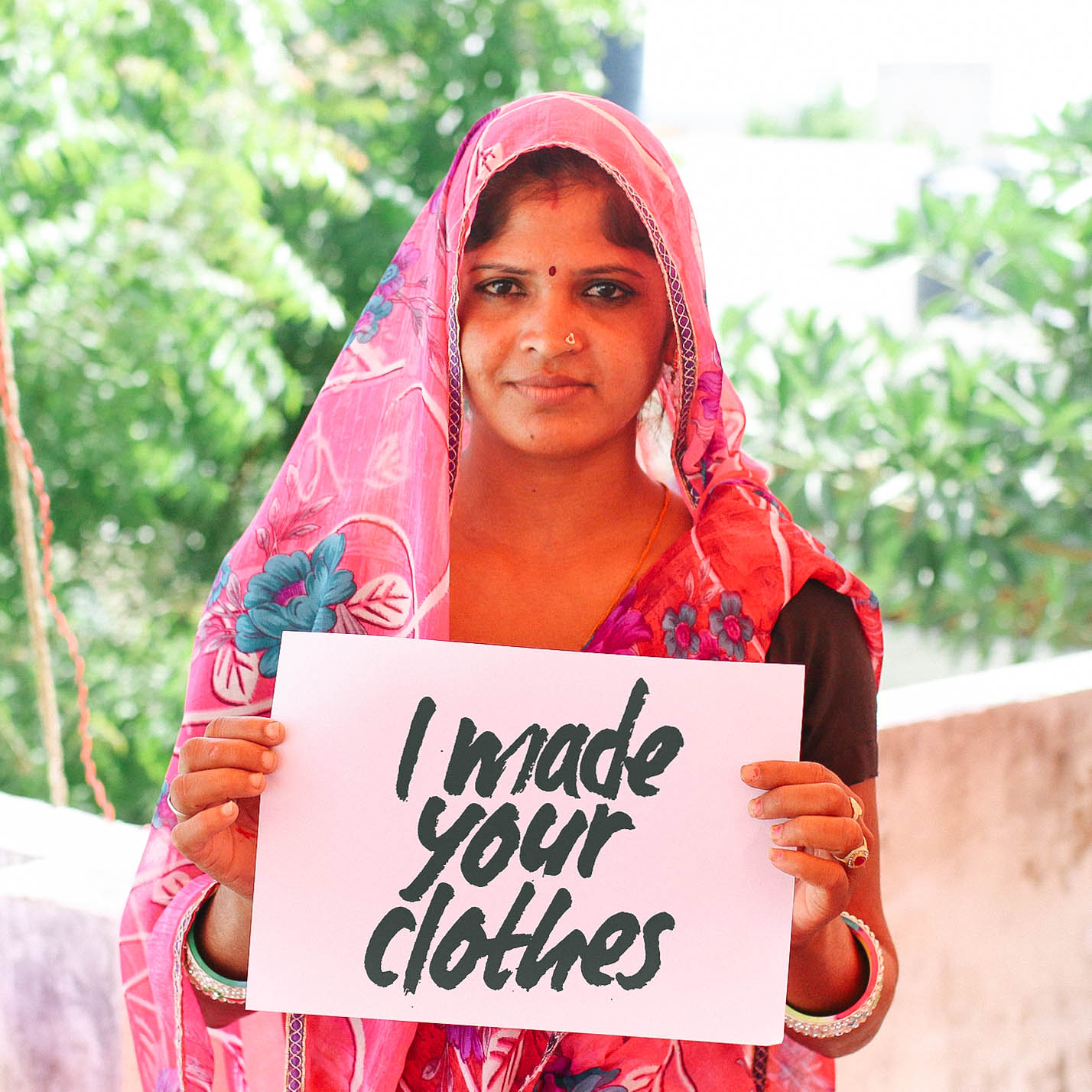 Local artisan partner in India upcycles and overdyes saris, turning them into hand-stitched scarves (Anchal Project).