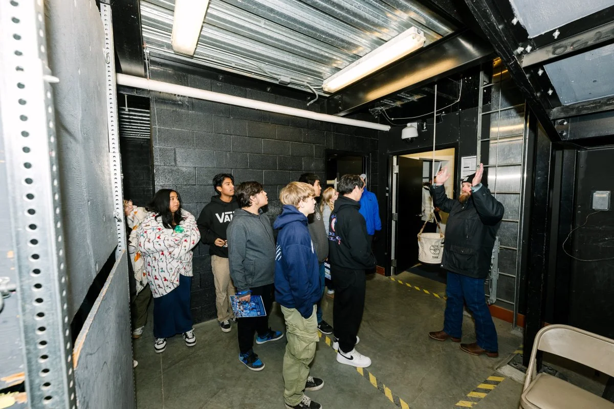  Ben Culver, Hanford Mission Integration Solutions’ Industrial Safety Training manager at the Volpentest HAMMER Federal Training Center, guides students through the facility’s Search &amp; Rescue Building as part of a recent Hanford STEM Day event. 