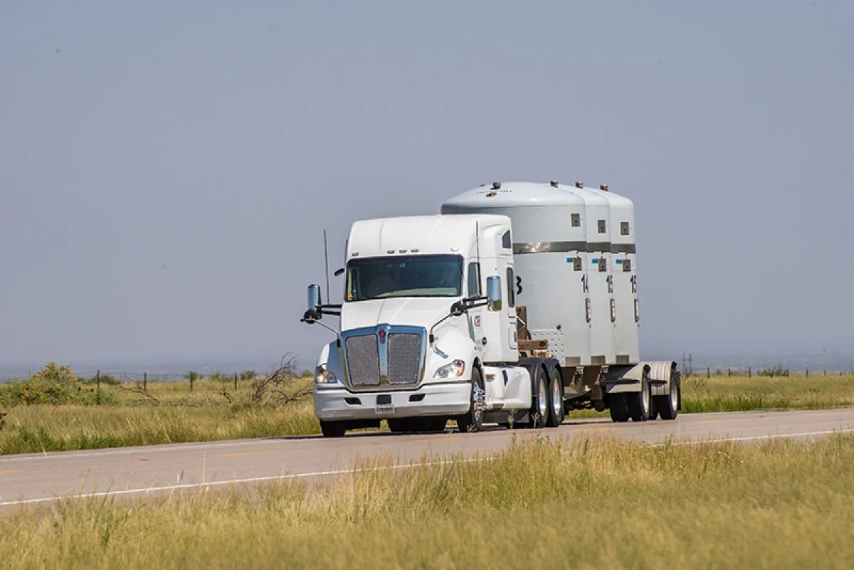  A waste transport delivery truck carrying three casks containing transuranic waste is shown en route to the U.S. Department of Energy Office of Environmental Management’s Waste Isolation Pilot Plant in New Mexico 