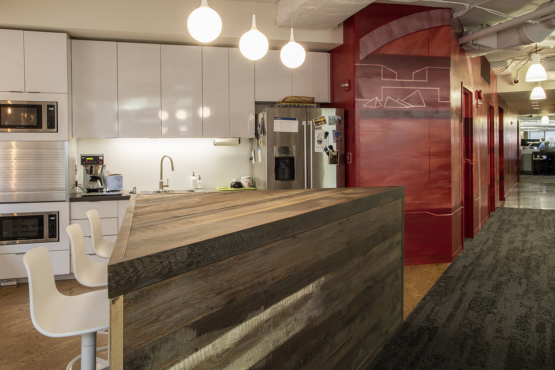 Photo: Alston Thompson Photography Surface Architectural Supply sourced and finished the wood for the island in the kitchen at HKS Architects in Washington, DC.