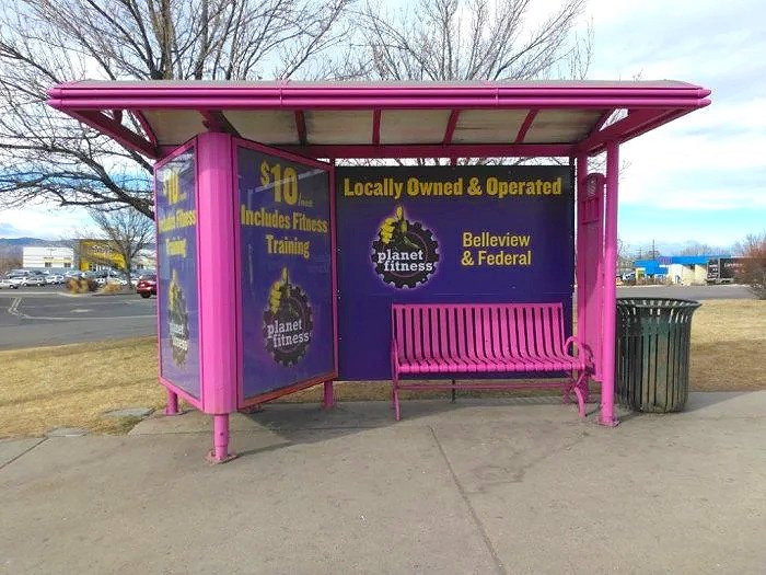 Planet Fitness bus shelter advertisement in the Denver metro area