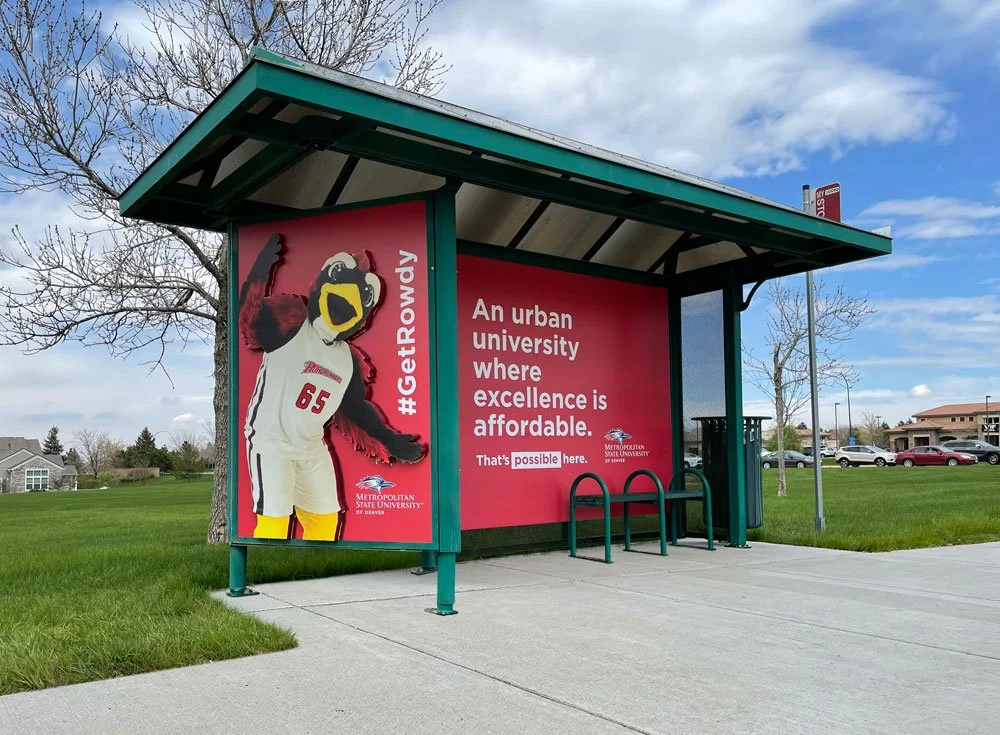 Metropolitan State University gold full house bus shelter ad with buildout in Denver