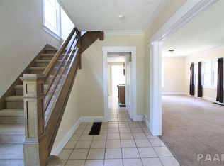 1608 Fredonia-foyer-stairs-living room.jpg