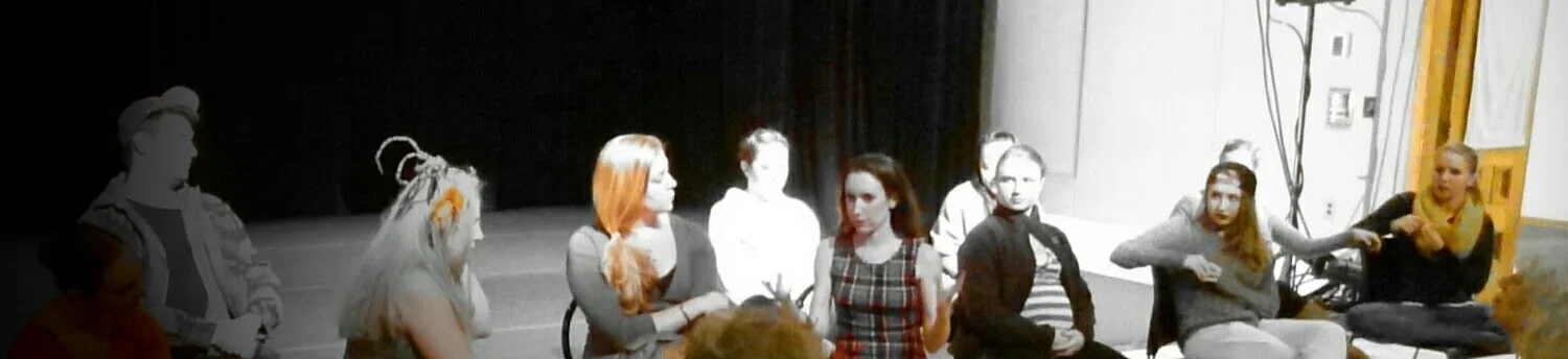 Leading a SPORK after Luminarium’s Spektrel at the Multicultural Arts Center. I am the one with the spider fascinator on. Goofy headwear also helps make the conversation less intimidating. (Photo by Jason Ries)