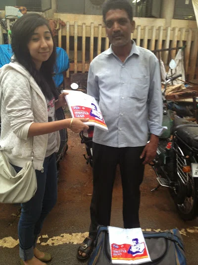 Buying from a street vendor to give away to the needy.WIN WIN.