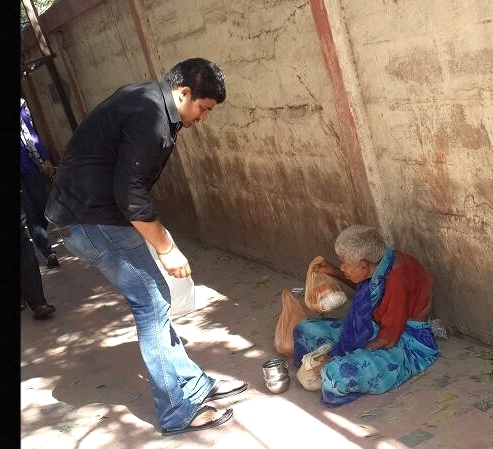 Distributing food to those who cannot help themselves