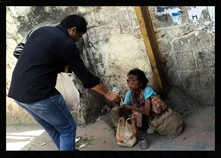 Distributing food to those who cannot help themselves