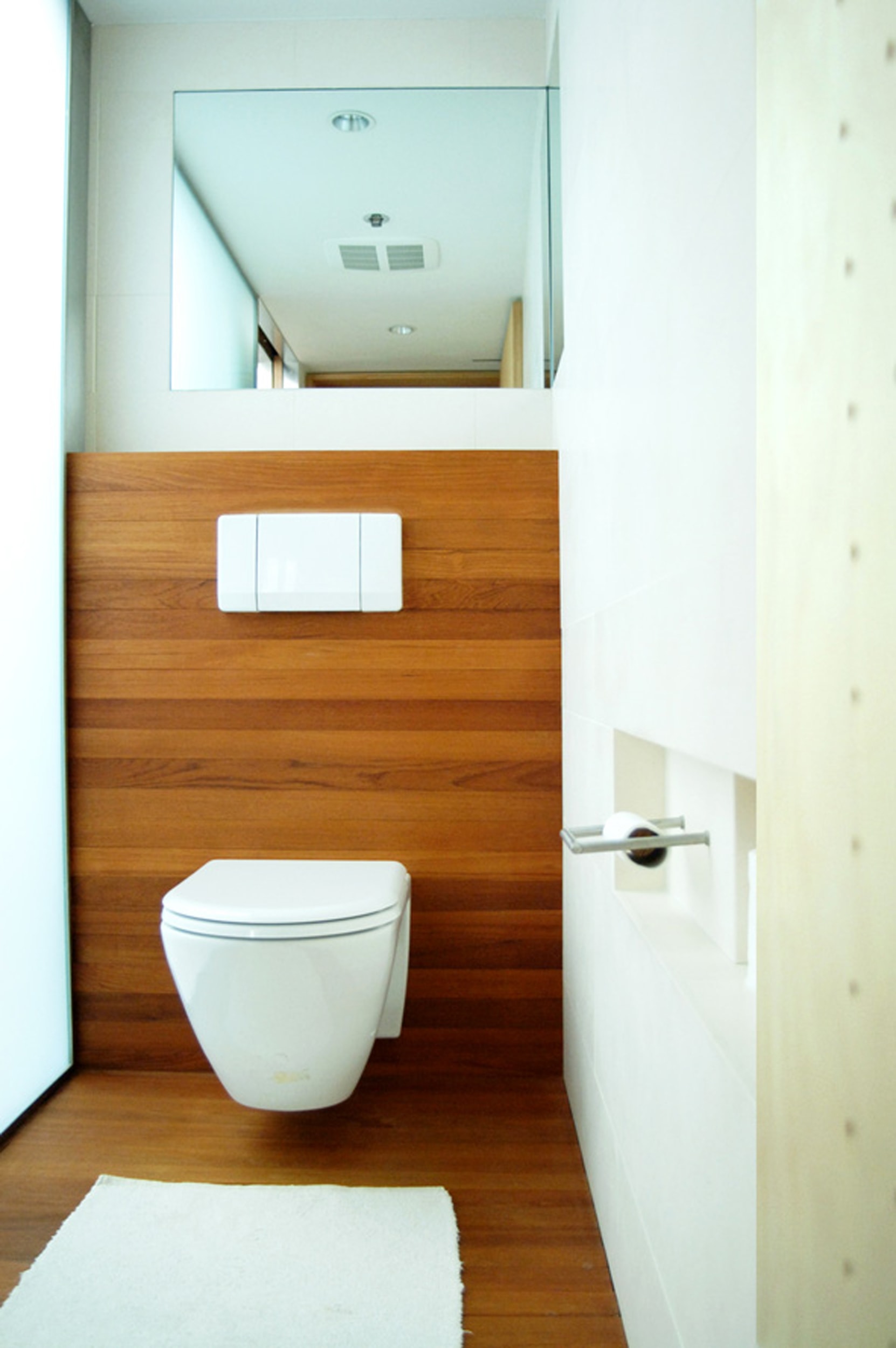 Modern Loft Apartment Renovation | Brooklyn Heights New York City | Bathroom White Wood Behind Toilet | RES4