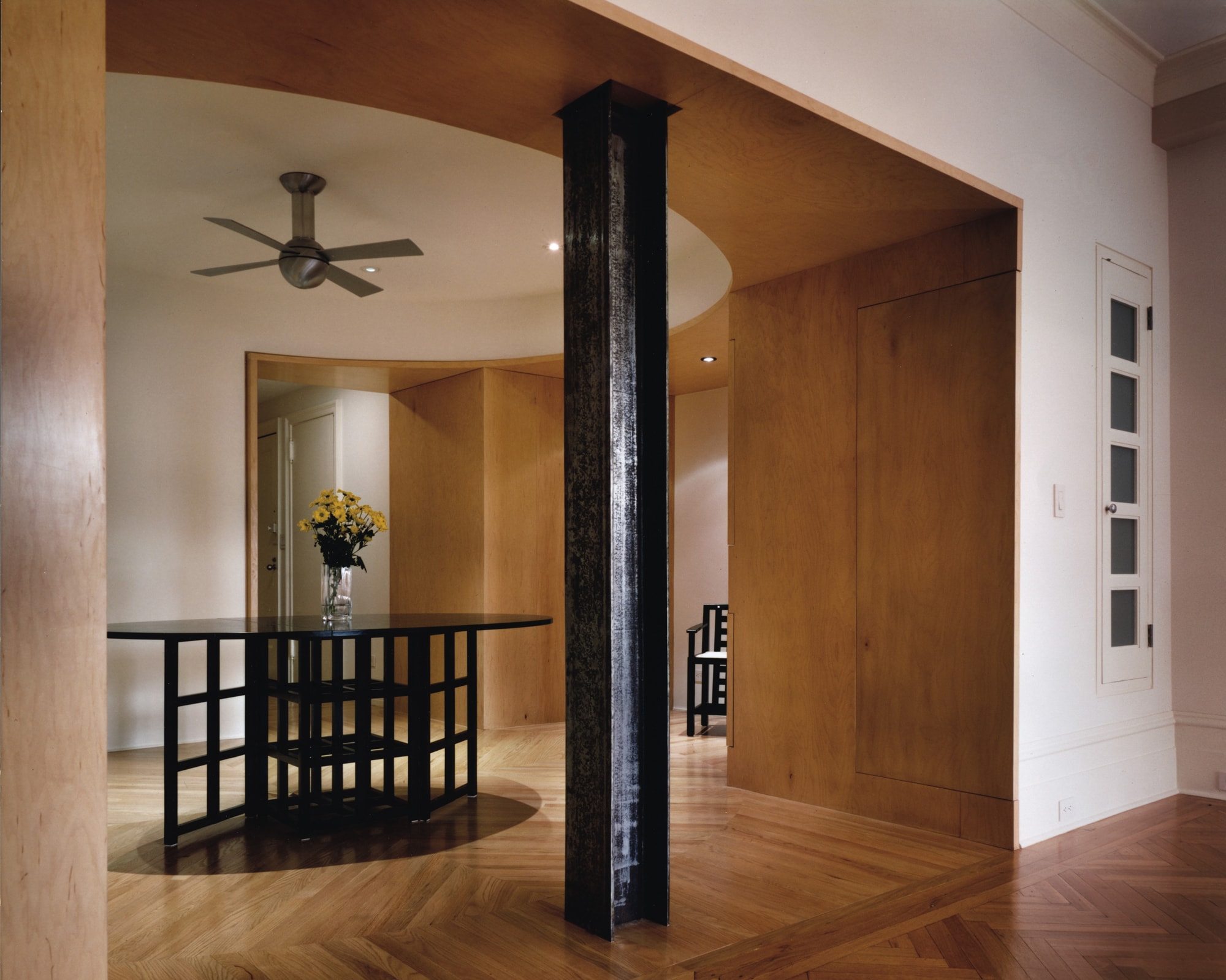 Modern Apartment Renovation | Upper East Side Manhattan New York City | Foyer Exposed Steel Column Curved Wood Portal Opening Wood Flooring | RES4