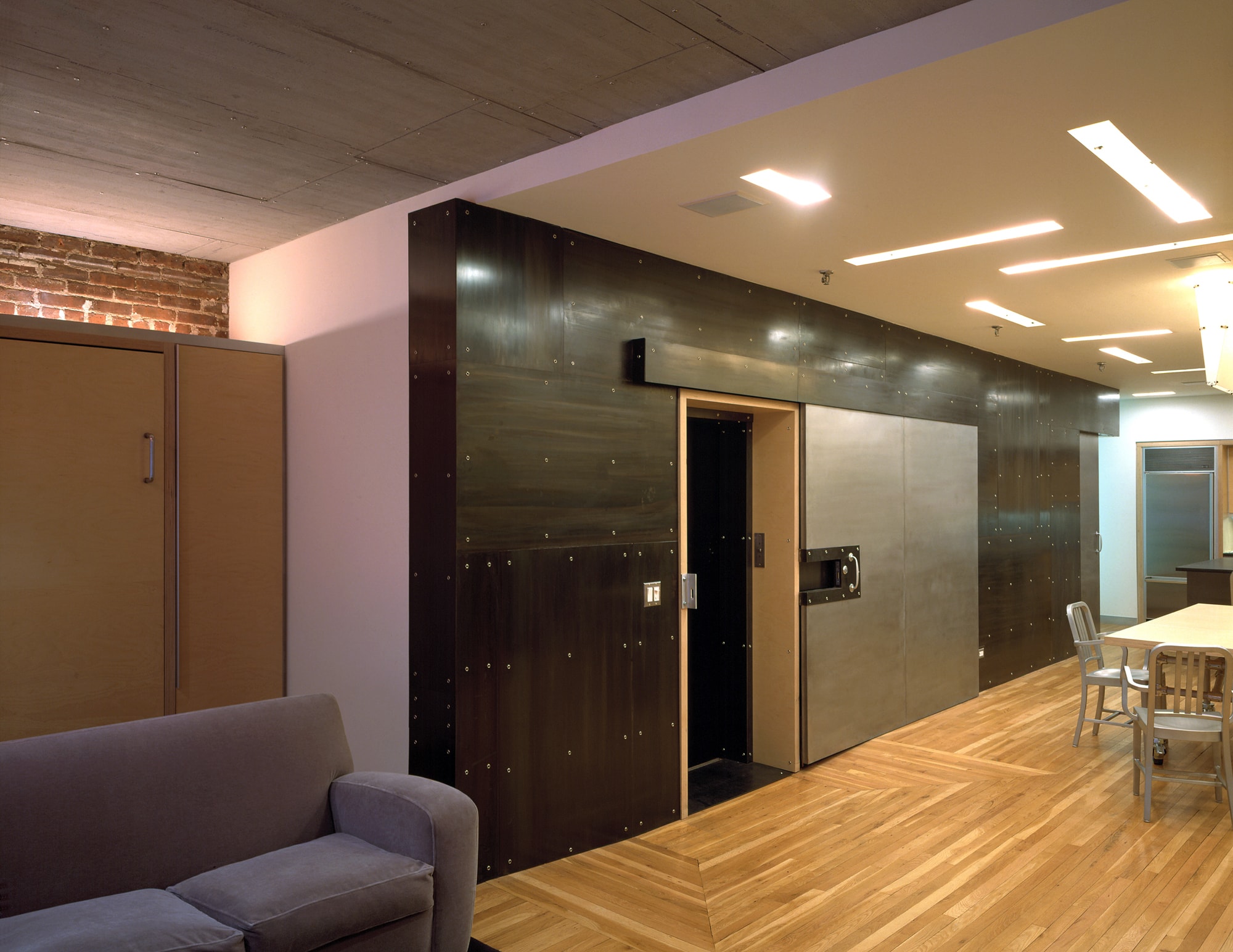 Modern Apartment Loft Renovation | Chelsea Manhattan New York City | Entry Dining Living Room Black Steel Wall Elevator Light Coves | RES4