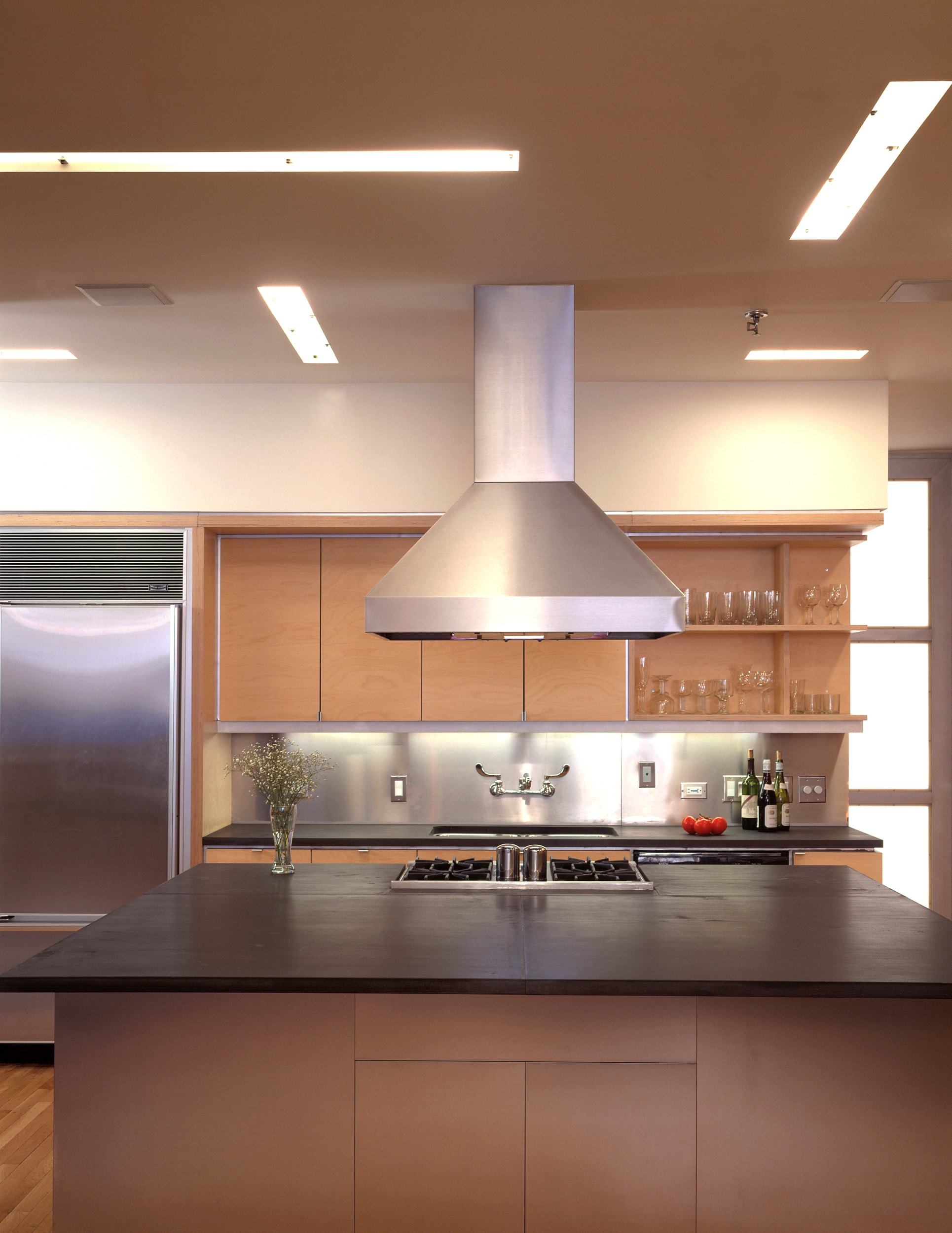 Modern Apartment Loft Renovation | Chelsea Manhattan New York City | Kitchen Island Black Countertop Custom Cabinets Stainless Steel Backsplash | RES4
