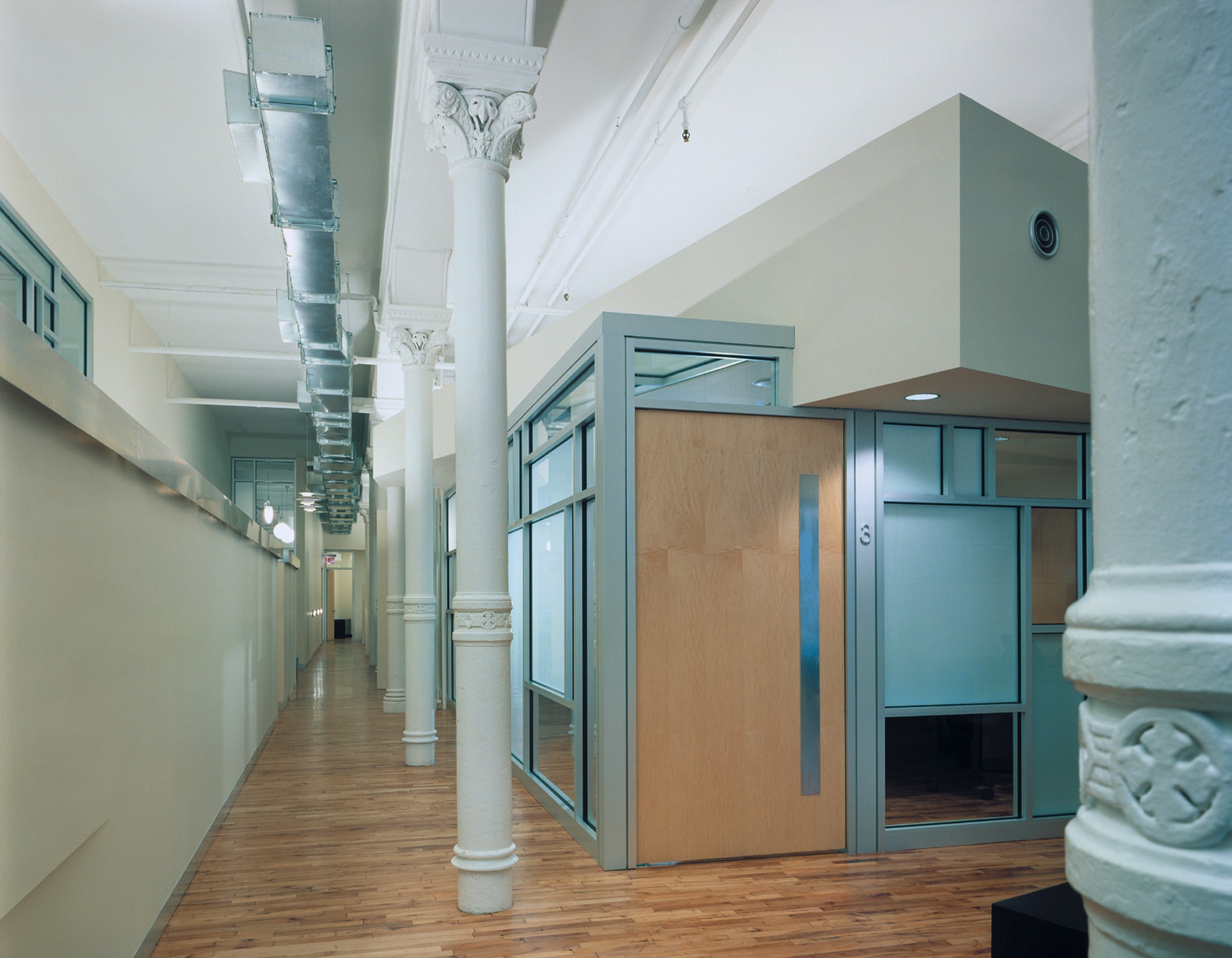 Equinox Offices Headquarters Modern Heath Fitness Center Renovation | Manhattan New York | Exposed Column Structure Storefront Office Wood Door | RES4