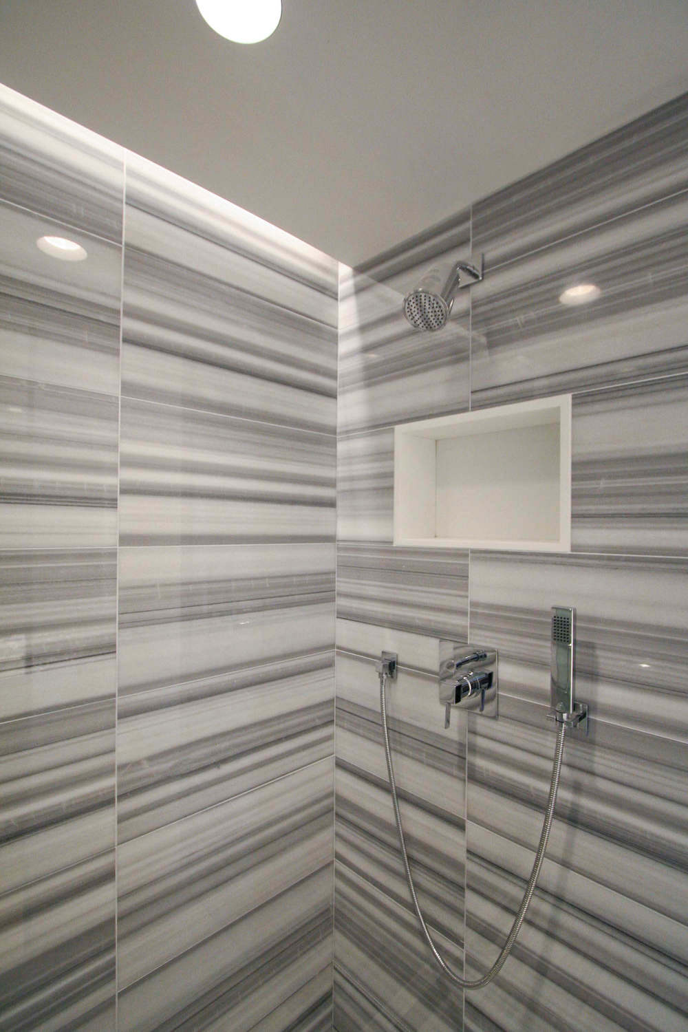 Powder Room (with secret shower hidden behind a sliding panel) - "Zebra" tile
