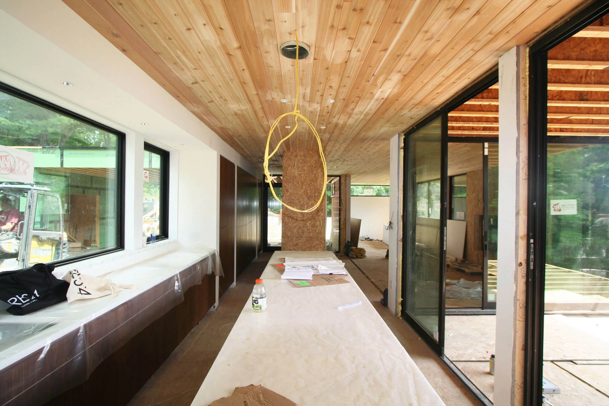 Material - STK cedar ceiling, walnut cabinetry and corian countertops