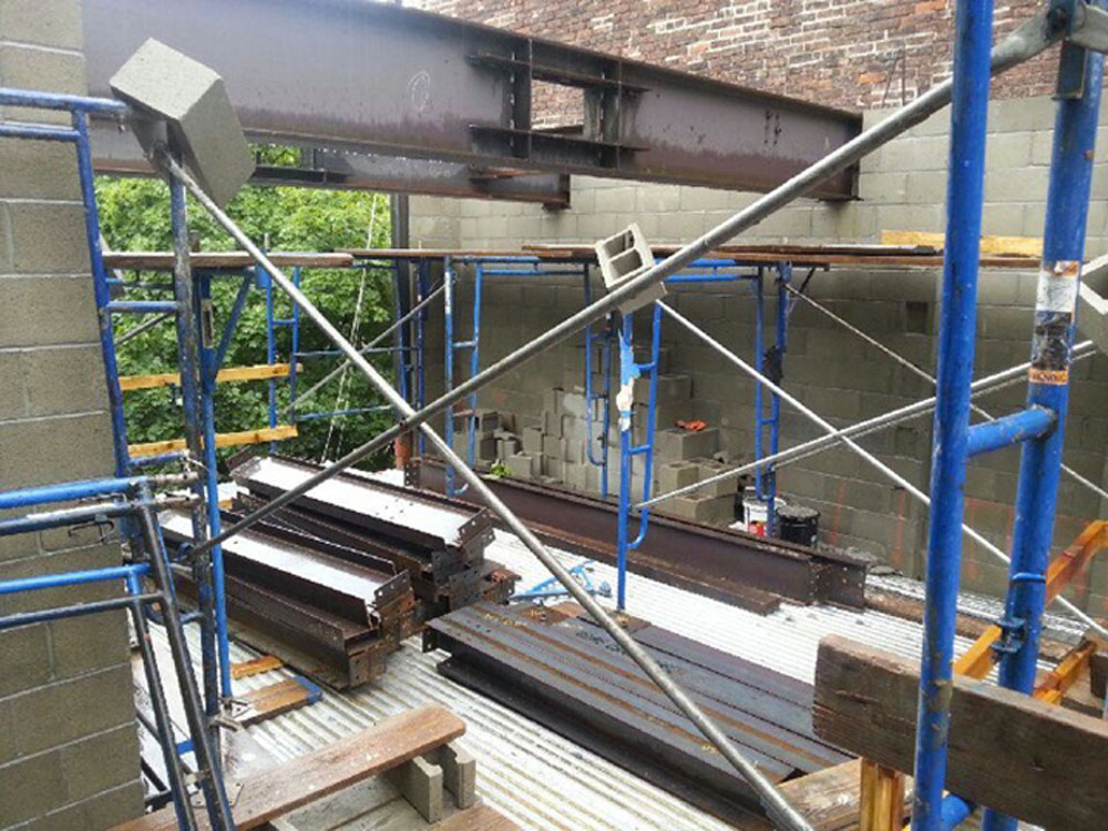   Steel beams laid out and ready for assemblage  