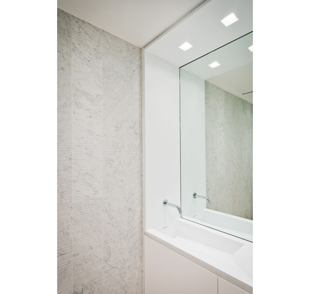   Bathroom -  &nbsp;Modern wall-mounted bathroom faucet fixture with corian countertop sink.  