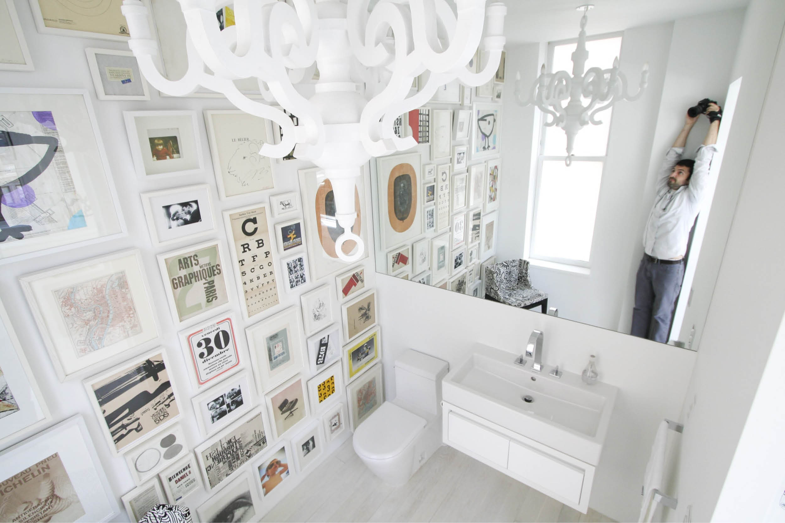 Modern New York City Union Square Loft Renovation | White Powder Room Bathroom with Art | RES4