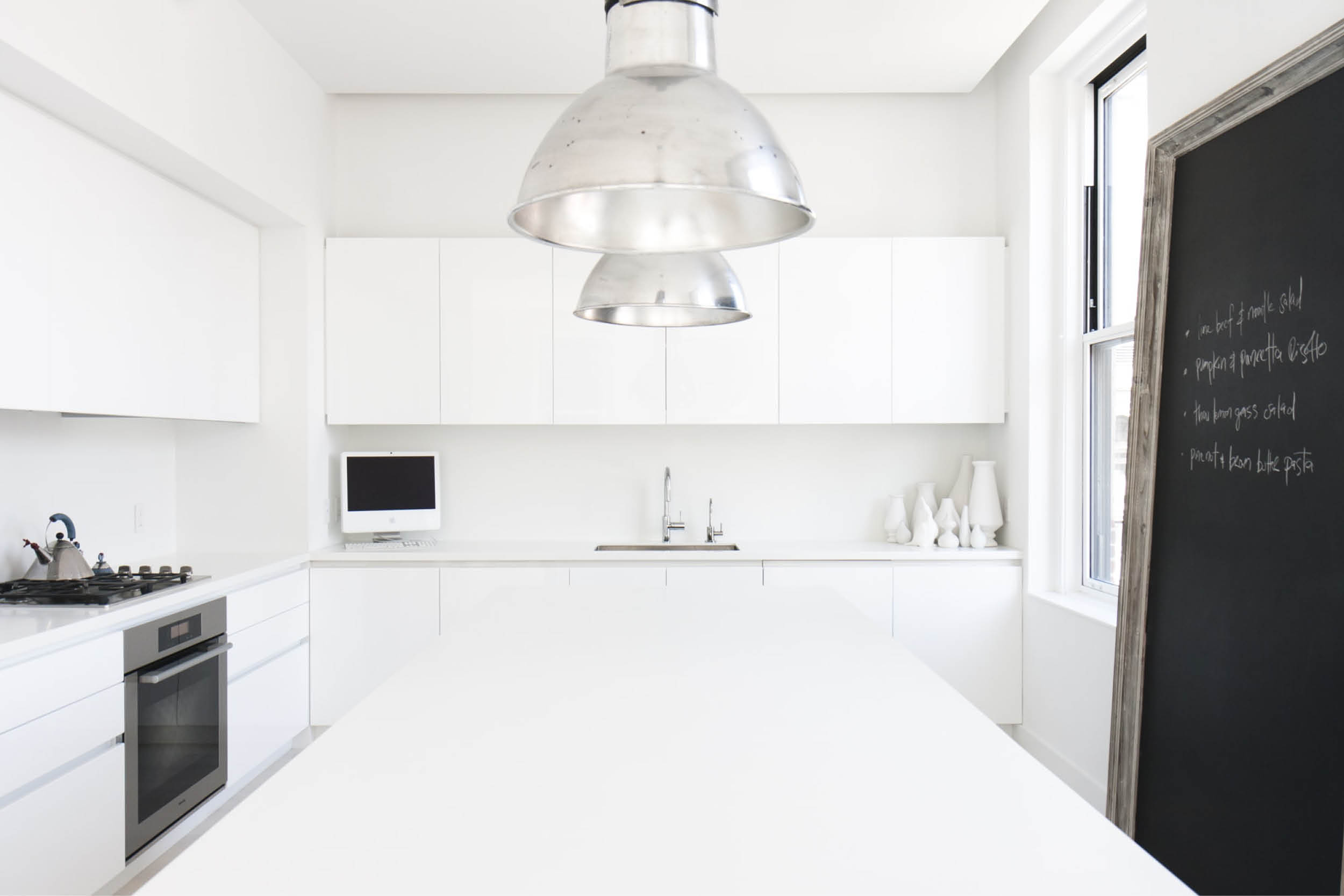 Modern New York City Union Square Loft Renovation | White Kitchen Island Custom Cabinets | RES4