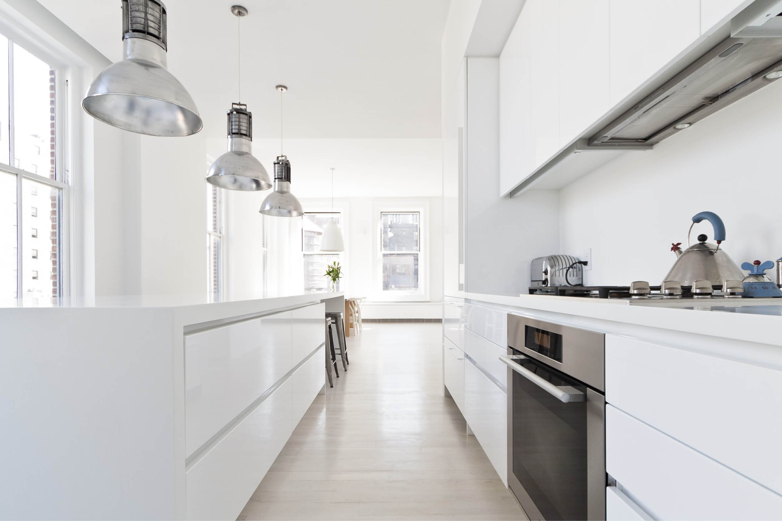 Modern New York City Union Square Loft Renovation | White Kitchen Island Custom Cabinets | RES4