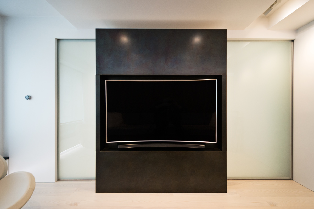 Modern New York City Lenox Hill Apartment Renovation | Black Steel TV Media Wall Pocket Doors | RES4