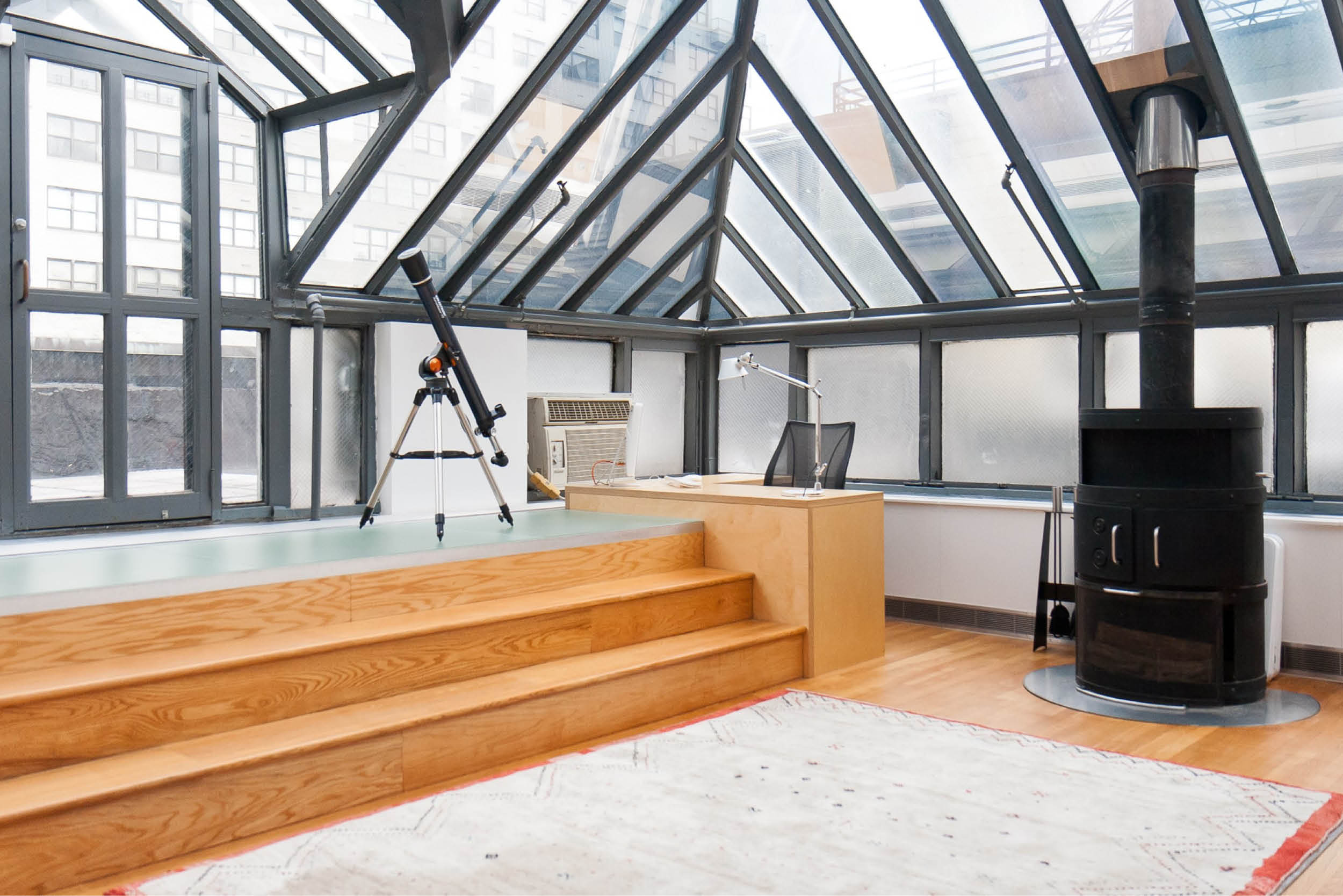 Loft Apartment Renovation | Union Square New York City 14th Street | Living Room Skylight Glass Roof Wood Steps Fireplace | RES4