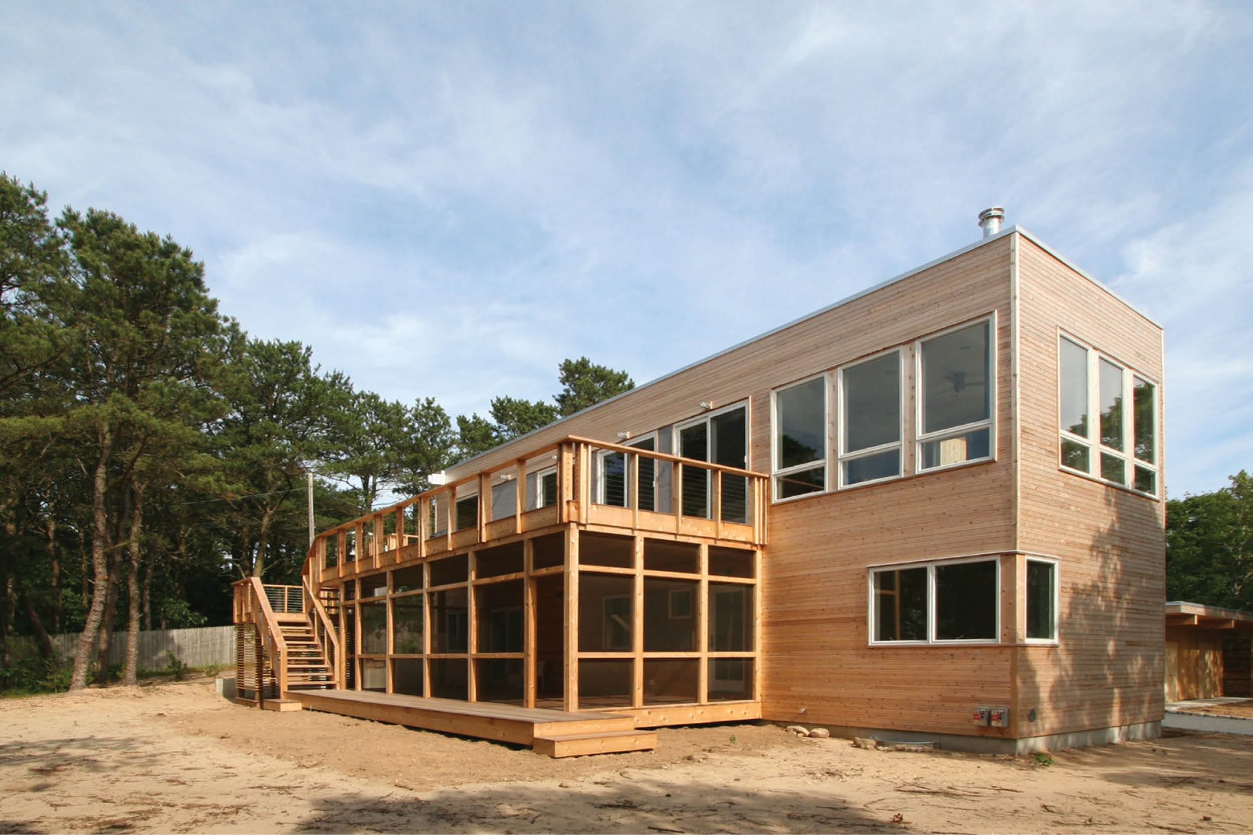 Modern Modular Prefab Peconic Bay House | Shinnecock Hills Hamptons New York | Screen Porch Cedar Cement Board Siding White Windows Deck Cedar Screen Rail | RES4