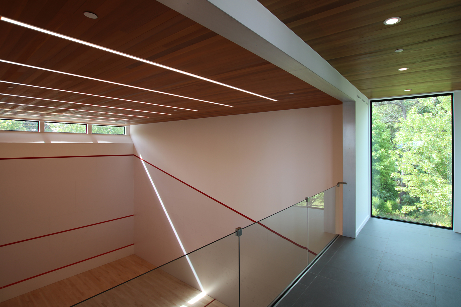res4-resolution-4-architecture-modern-modular-house-prefab-amagansett-addition-interior-gym-lighting.jpg