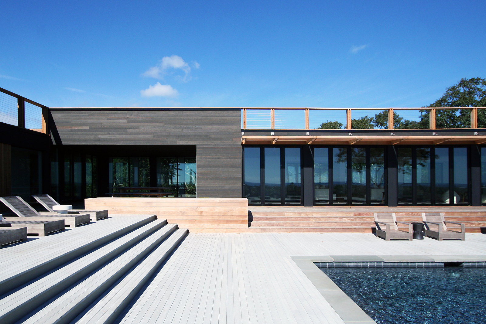 res4-resolution-4-architecture-modern-modular-house-prefab-amagansett-addition-exterior-facade-pool-deck-terrace.jpg