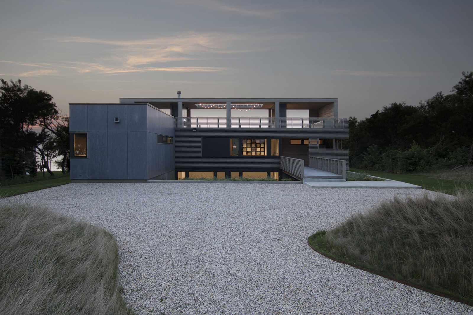 12-res4-resolution-4-architecture-modern-modular-house-prefab-home-north-fork-bluff-house-exterior-facade-elevation-dusk.jpg