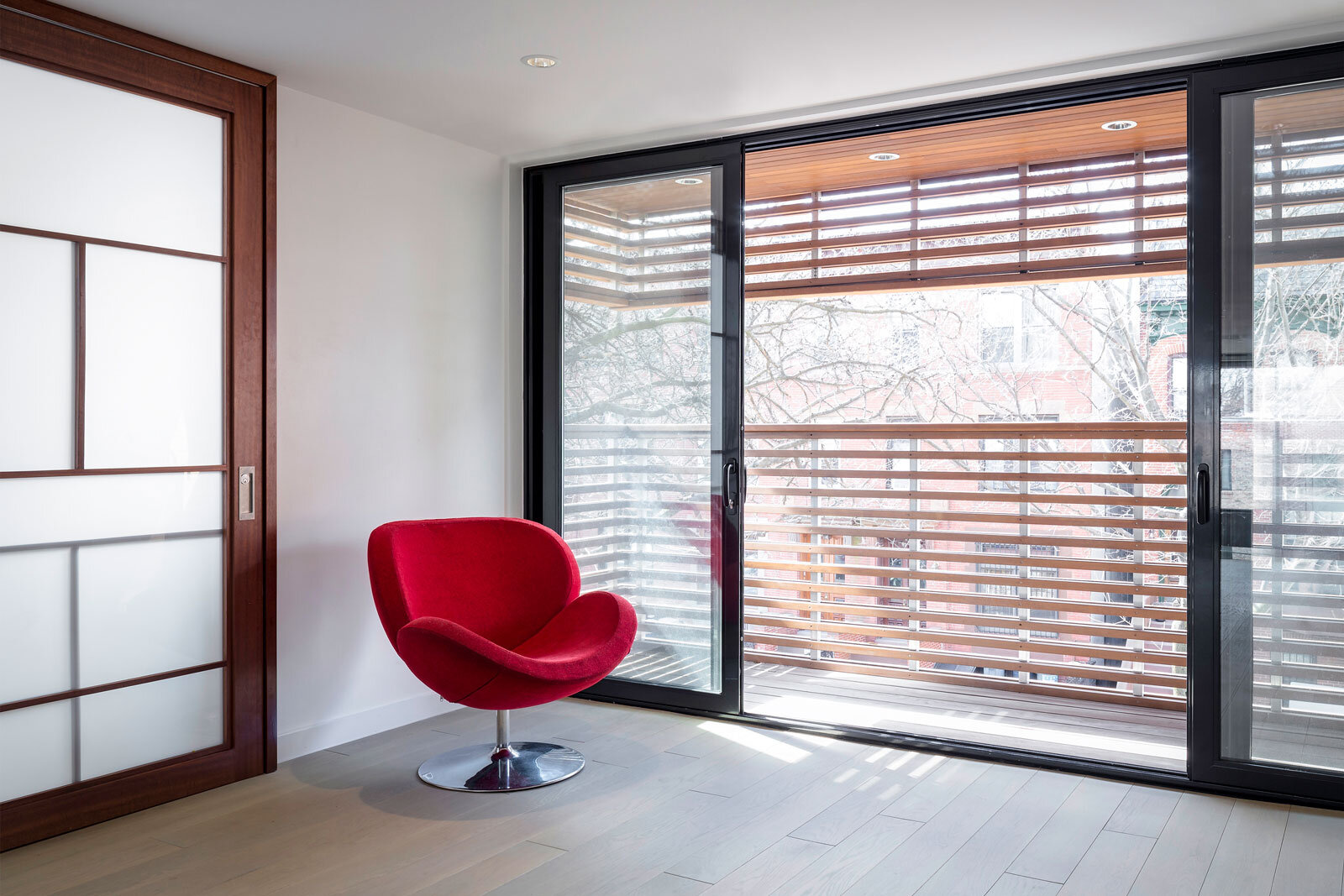 12-res4-re4a-resolution-4-architecture-park-slope-townhouse-brooklyn-modern-home-custom-mahogany-barn-door-frosted-glass-balcony-cedar-slats.jpg