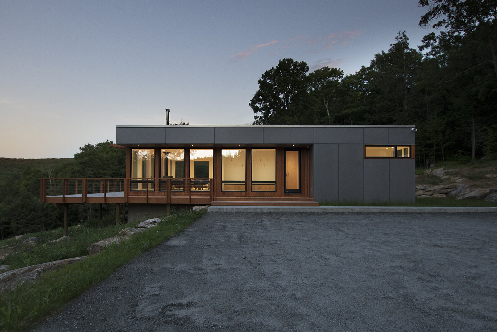 24-res4-re4a-resolution-4-architecture-modern-modular-prefab-sharon residence-exterior-night-entry court.jpg