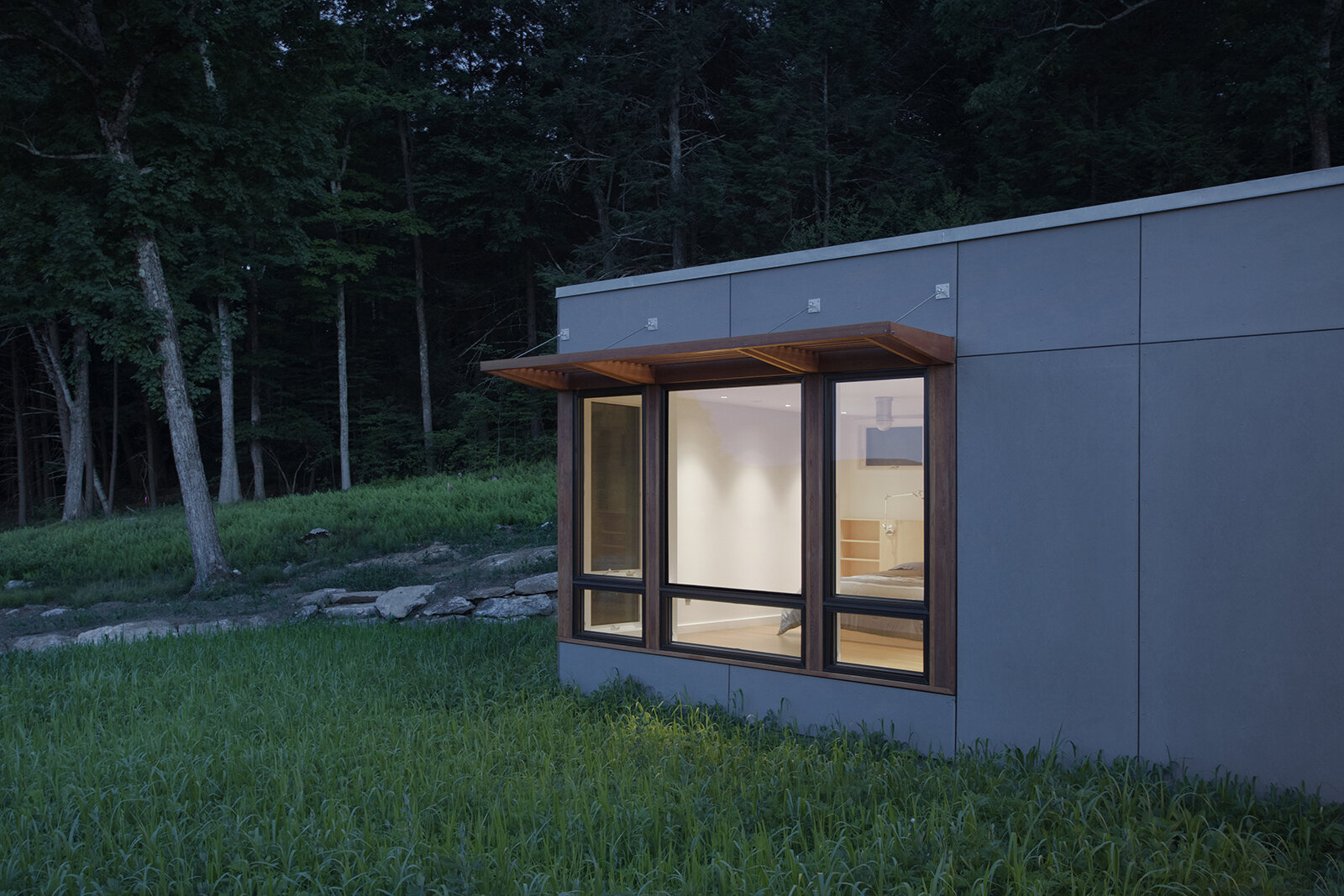25-res4-re4a-resolution-4-architecture-modern-modular-prefab-sharon residence-exterior-night-master-bedroom.jpg