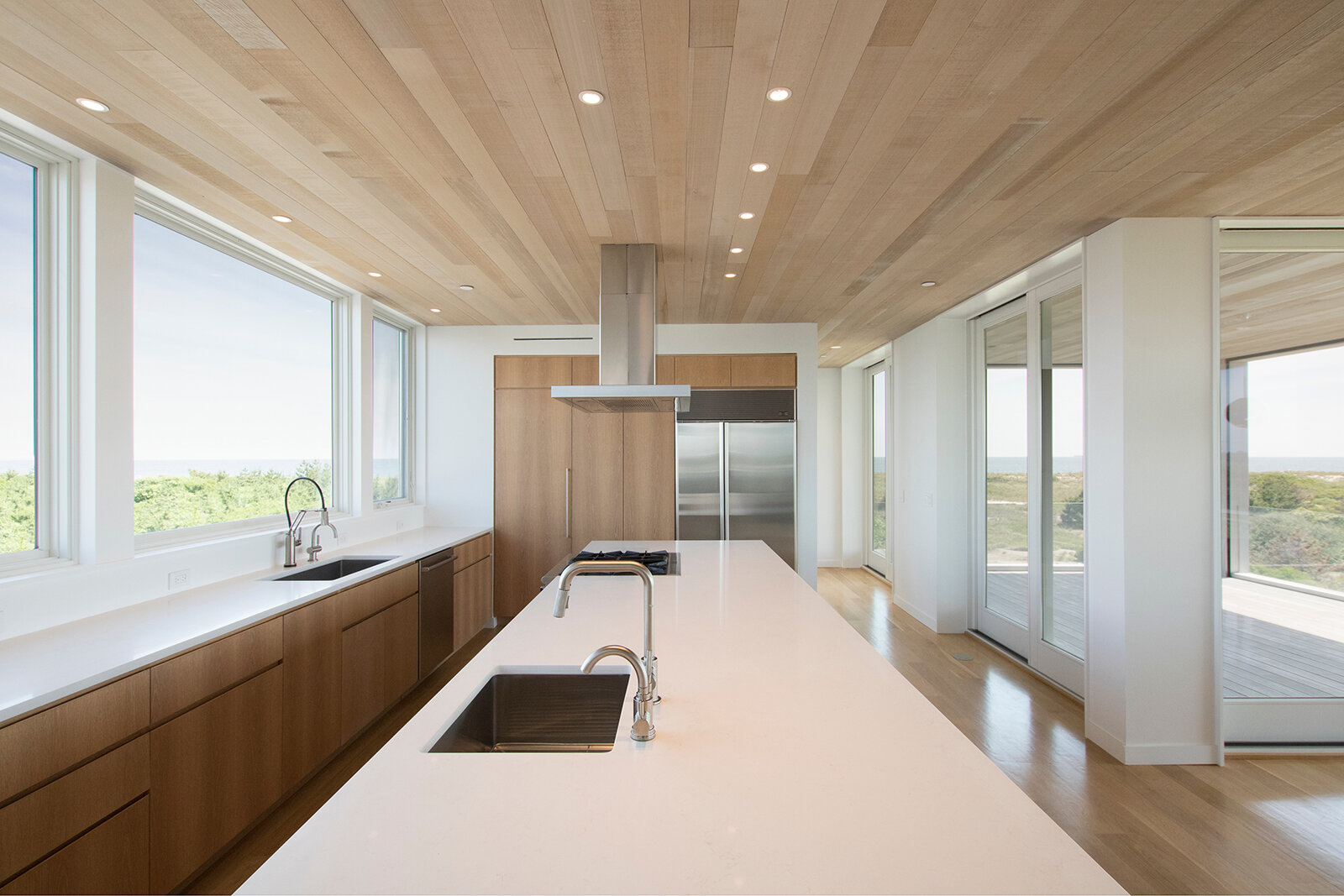 15-res4-resolution-4-architecture-modern-modular-house-prefab-home-lido-beach-house-2-long-island-ny-interior-kitchen-island.jpg