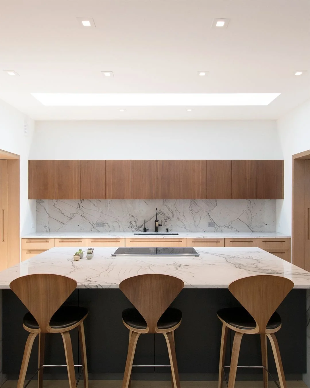 Our Fenimore Road Addition + Renovation project transforms a house originally designed by Kaneji Domoto, a disciple of Frank Lloyd Wright. The challenge was to respect and, when possible, enhance, the rather unique, sometimes quirky, existing details