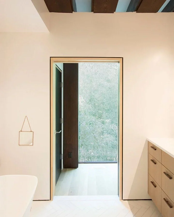 How do you update a unique home without losing what makes it special?

At Fenimore Road, we renovated and added to a midcentury home originally designed by Kaneji Domoto, a Frank Lloyd Wright disciple, whose work was deeply tied to the landscape. The