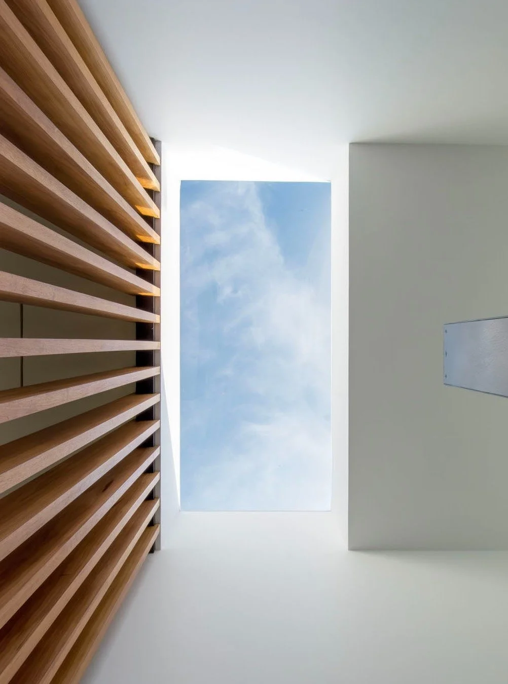 What if a stair didn&rsquo;t just connect floors&mdash;but opened to the sky?

At the Northwest Woods Residence, this three-story stair was designed as a light well. A James Turrell&ndash;inspired skylight sits at the top, detailed so the frame disap