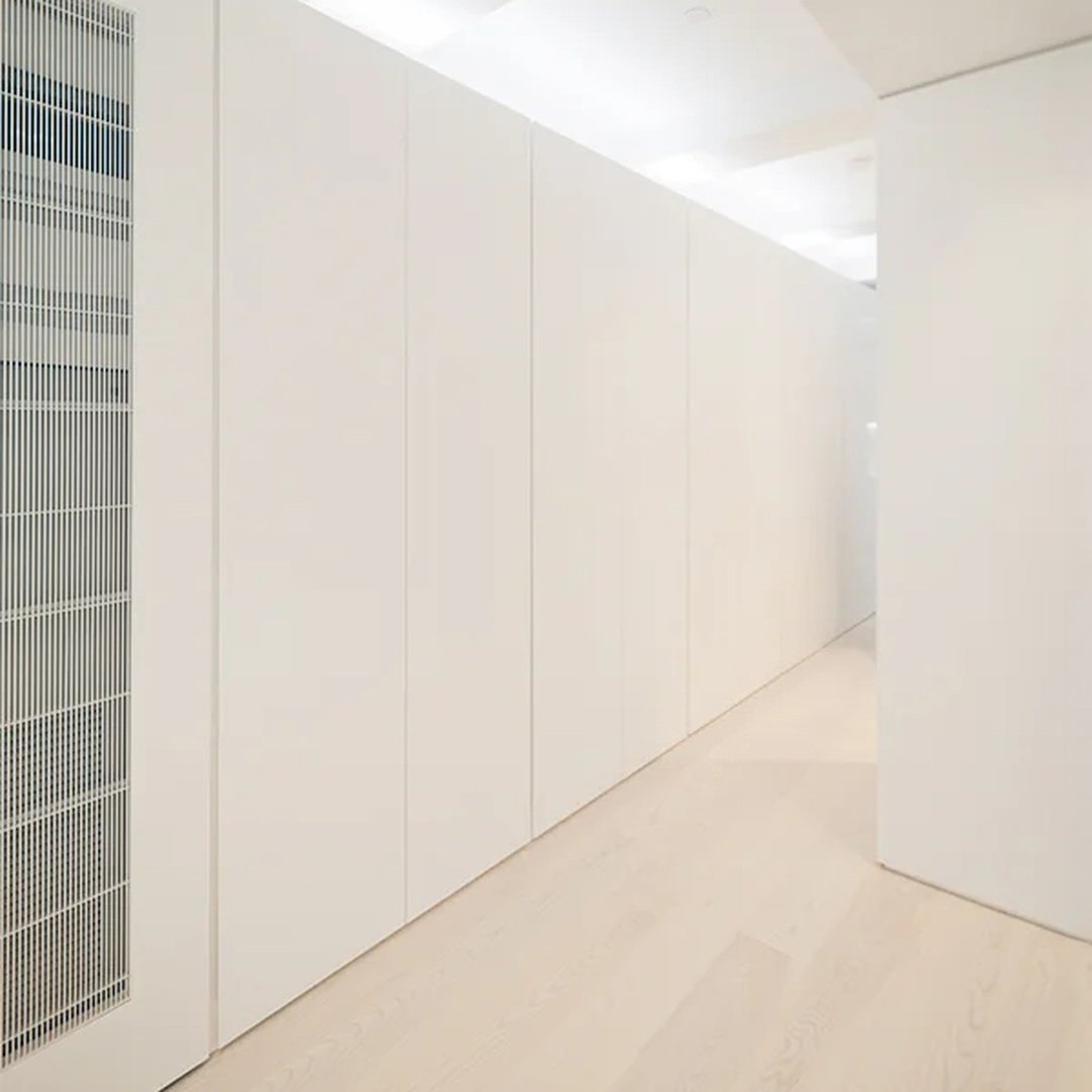 A well-designed home accounts for the things people actually need to store, access, conceal, and use every day.

These built-ins do more than add storage. At the Upper West Side Apartment, custom millwork conceals wardrobes and a media wall while all