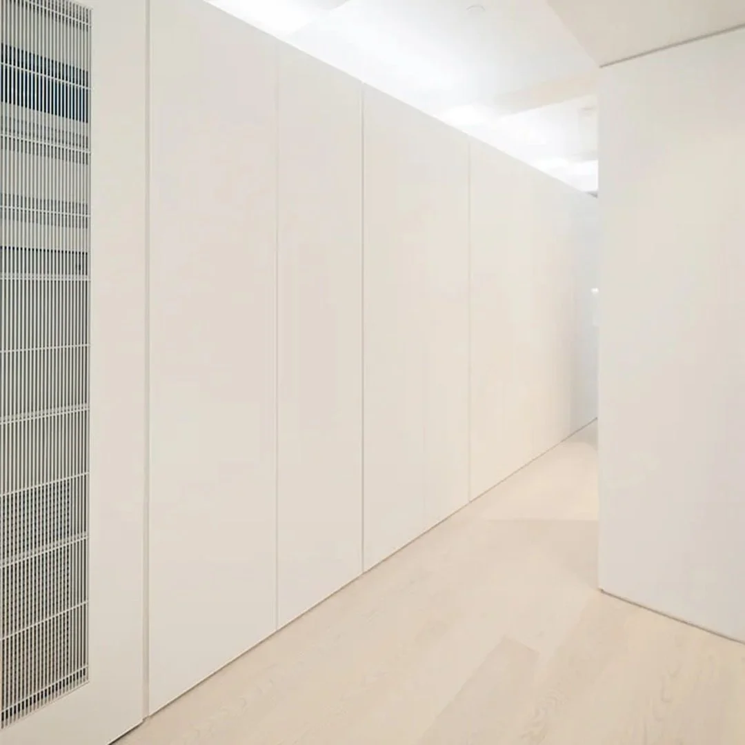 A well-designed home accounts for the things people actually need to store, access, conceal, and use every day.

These built-ins do more than add storage. At the Upper West Side Apartment, custom millwork conceals wardrobes and a media wall while all
