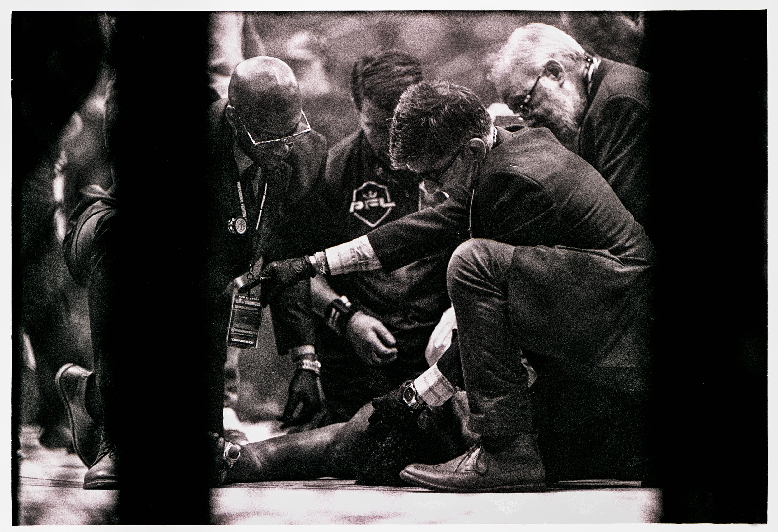 Inspection PFL Workers on Knockout Ring MSG NYC B&W Canon F1 Film.jpg
