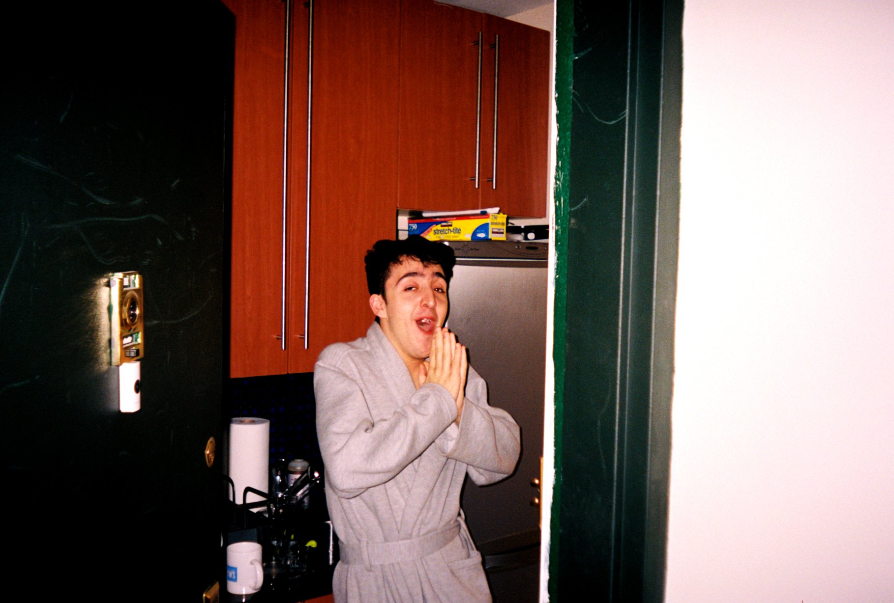 Alex Yawn at Apartment Door Snappy QT Film NYC Final.jpg