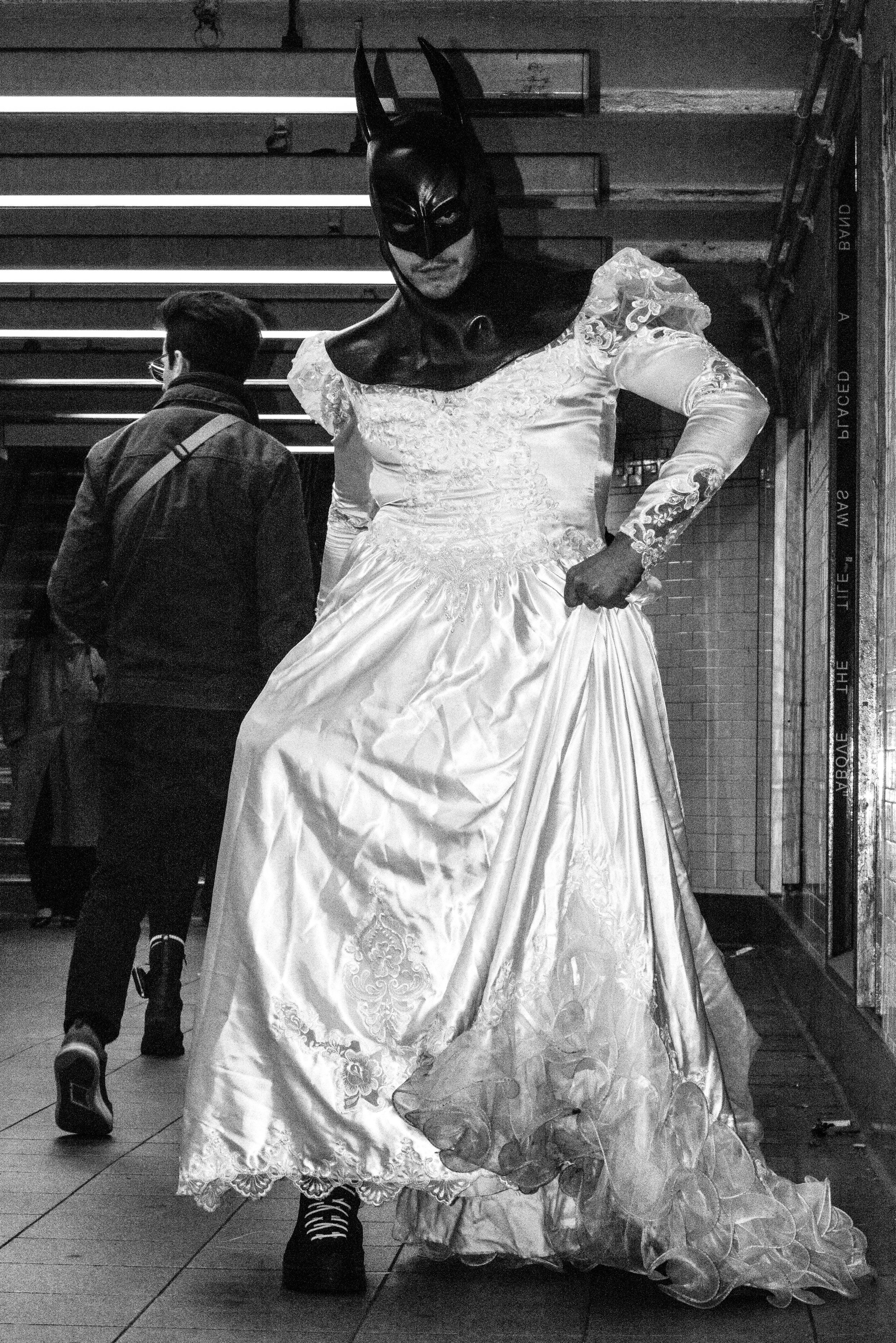 Batman in Dress Subway Pose B&W Halloween NYC 2.jpg