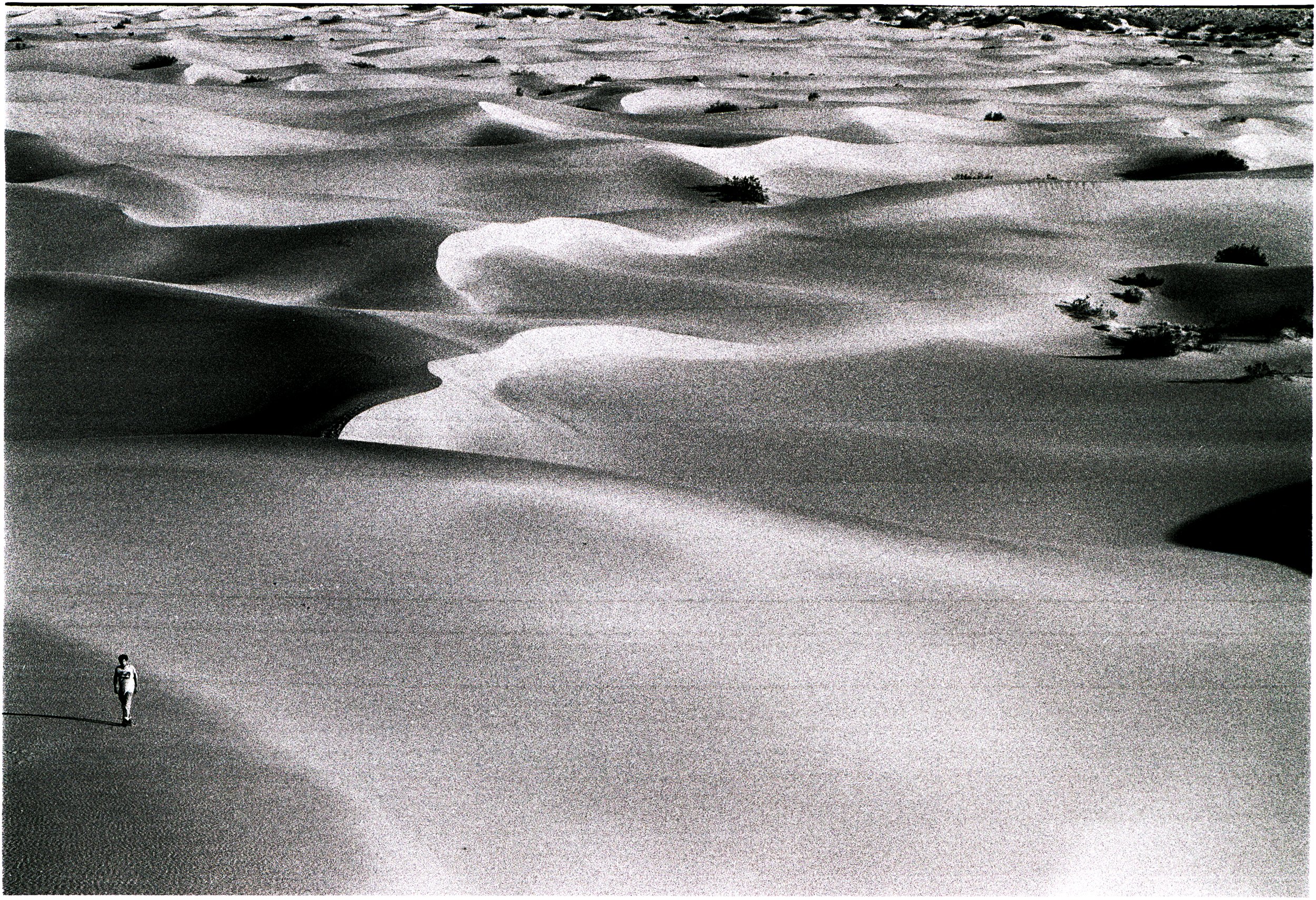 Joey Walks Sand Dunes Death Valley Nikon F B&W Film.jpg