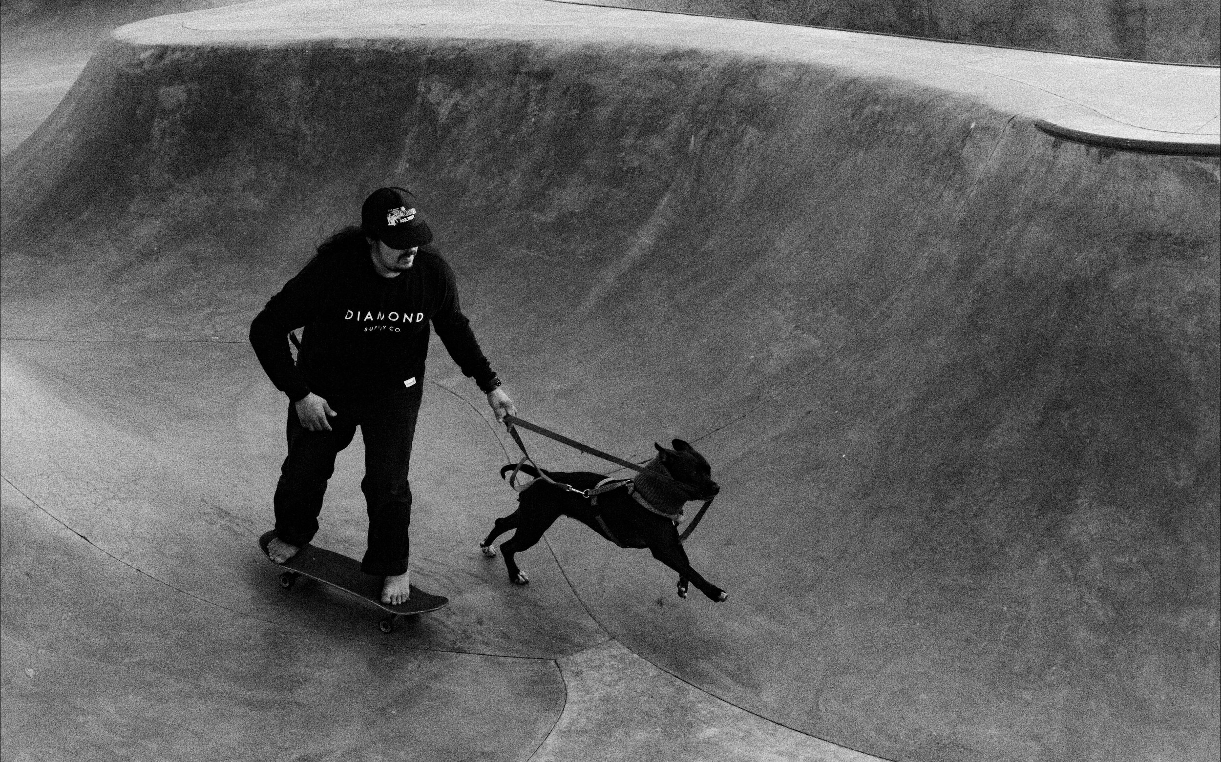 Man Skates with Dog Venice Beach LA B&W.jpg