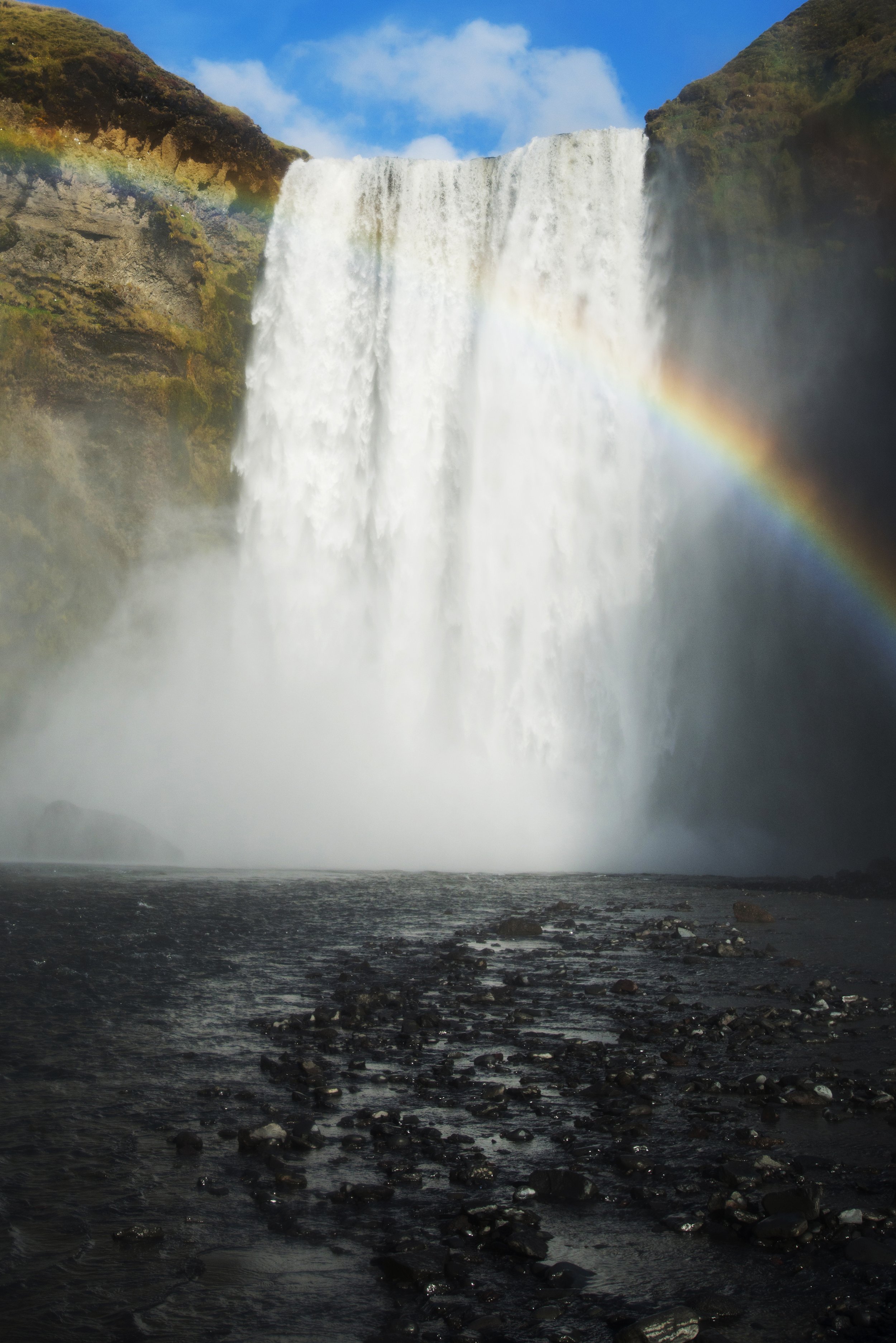 Skogafoss Waterfall in Iceland Rainbow.jpg
